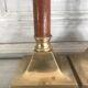 Pair of wood and brass candle holders