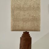 Large chamotte clay lamp in brutalist style, with a plant motif.