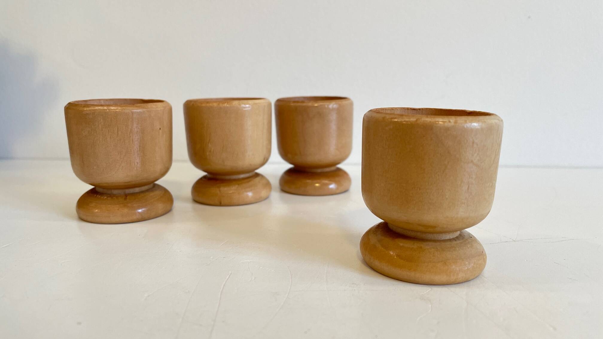 4 vintage turned wooden egg cups
