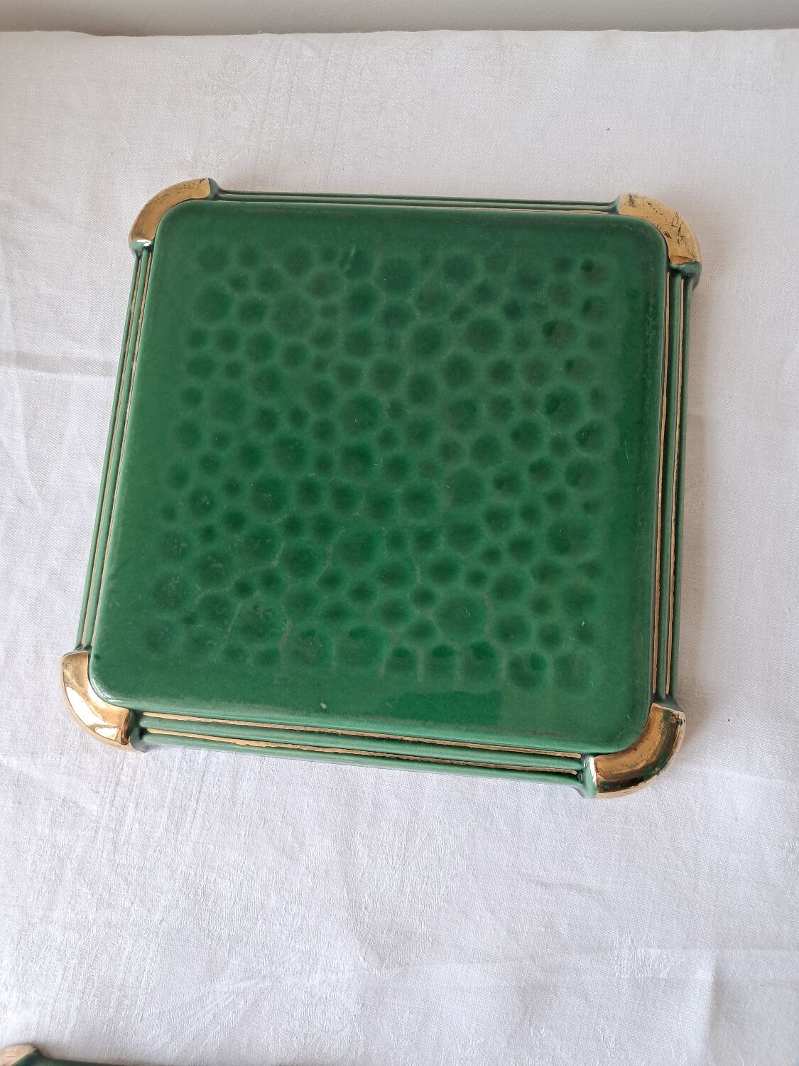Ceramic trivets and glasses from Poët-Laval. Vintage