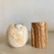 Pair of natural onyx candle holders