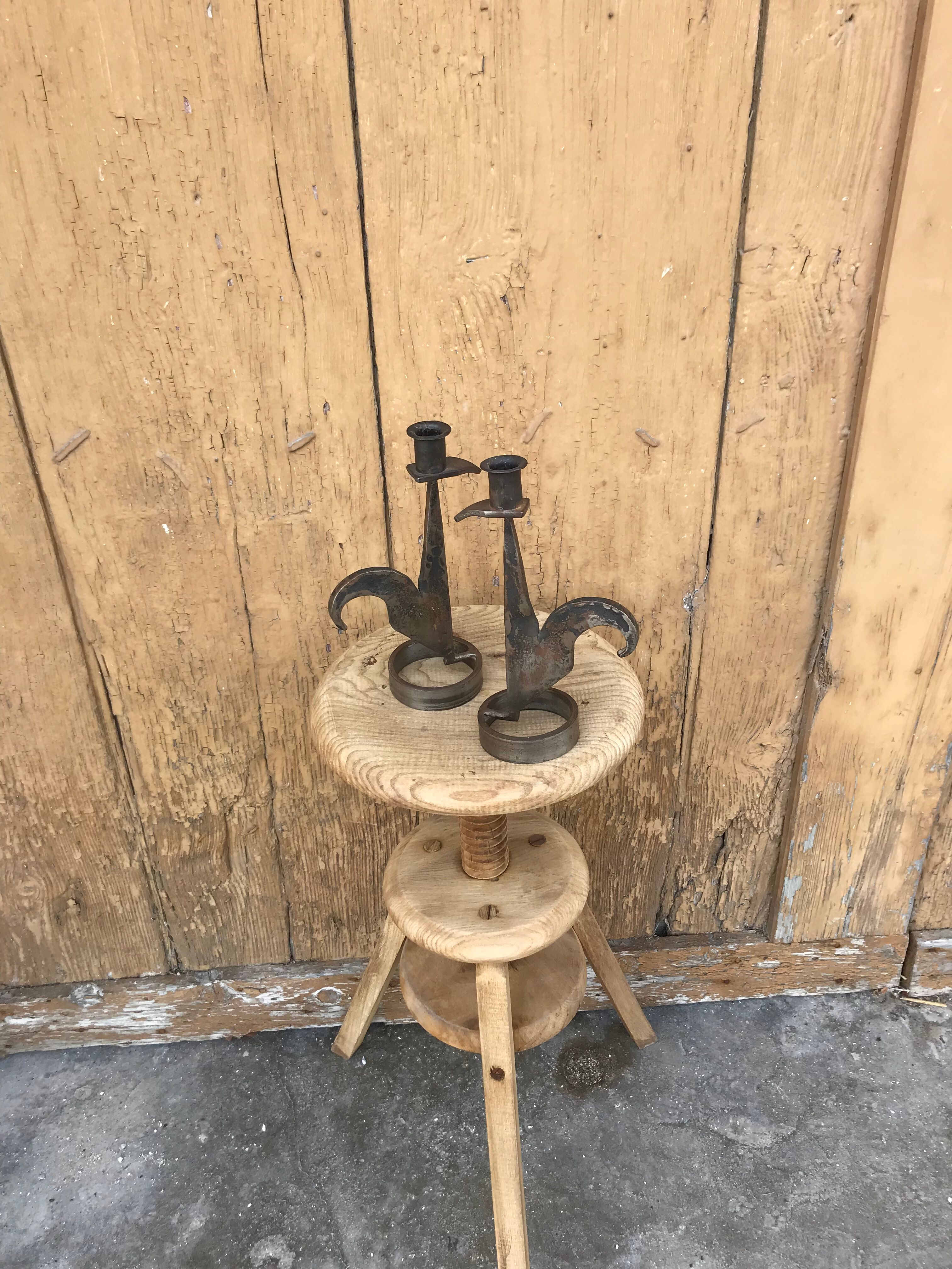 Signed zoomorphic iron candle holders