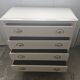 Vintage commode in solid pear wood, revamped in glossy white – tapered legs.