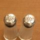 Saliere and pepper in solid silver cap