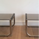 Pair of sofa ends in chrome, blackened wood and glass