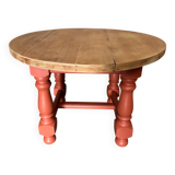 Round coffee table made of solid wood in orange color (soft color)