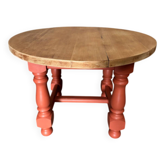 Round coffee table made of solid wood in orange color (soft color)