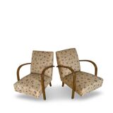 Ensemble de fauteuils Art Déco avec accoudoirs en hêtre arqués.