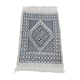 Traditional white and blue hand-woven wool carpet