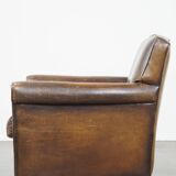 Sheepskin leather armchair with character and a touch of Art Deco design