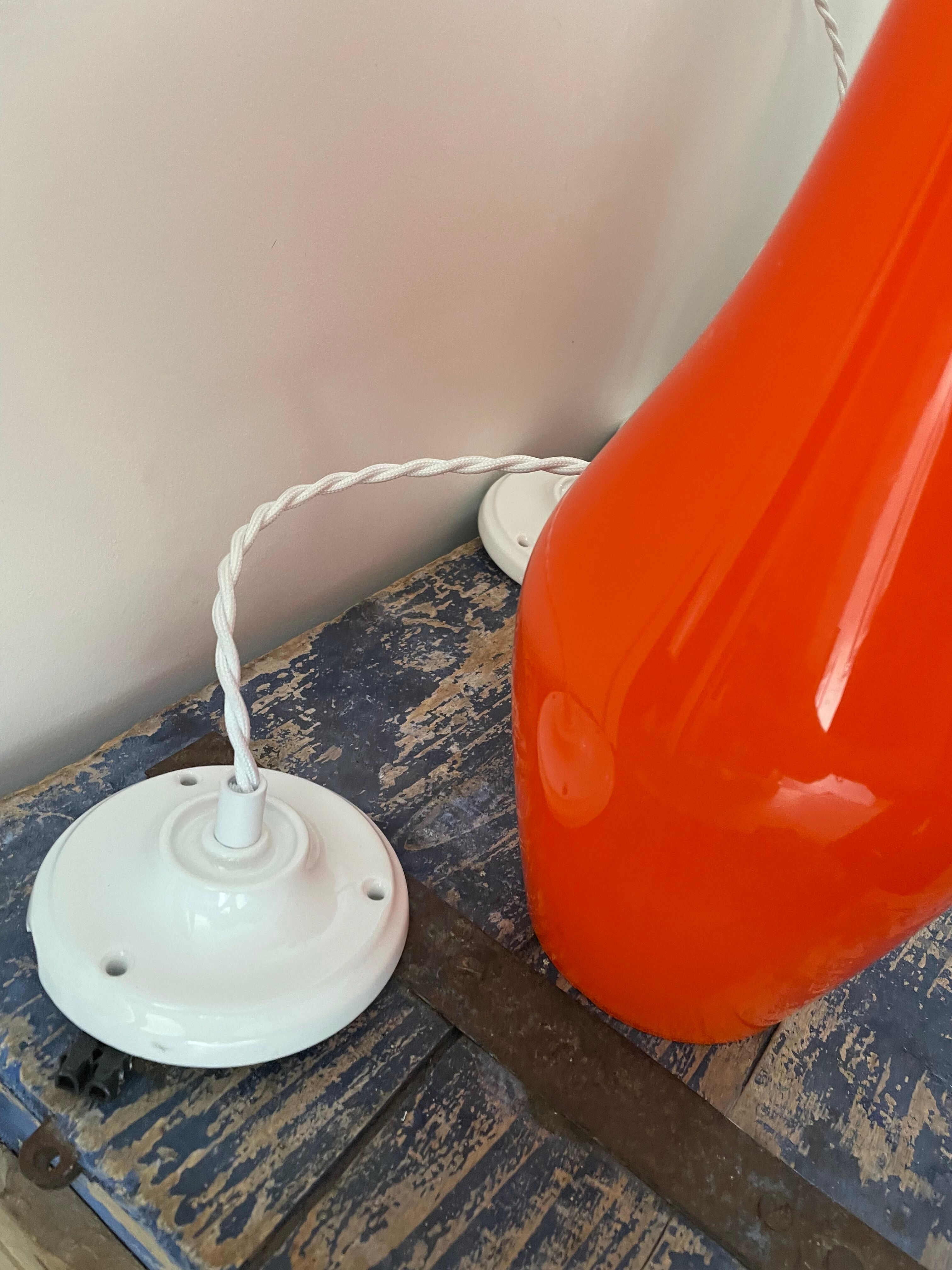 Set of three new electrified orange vintage pendant lamps