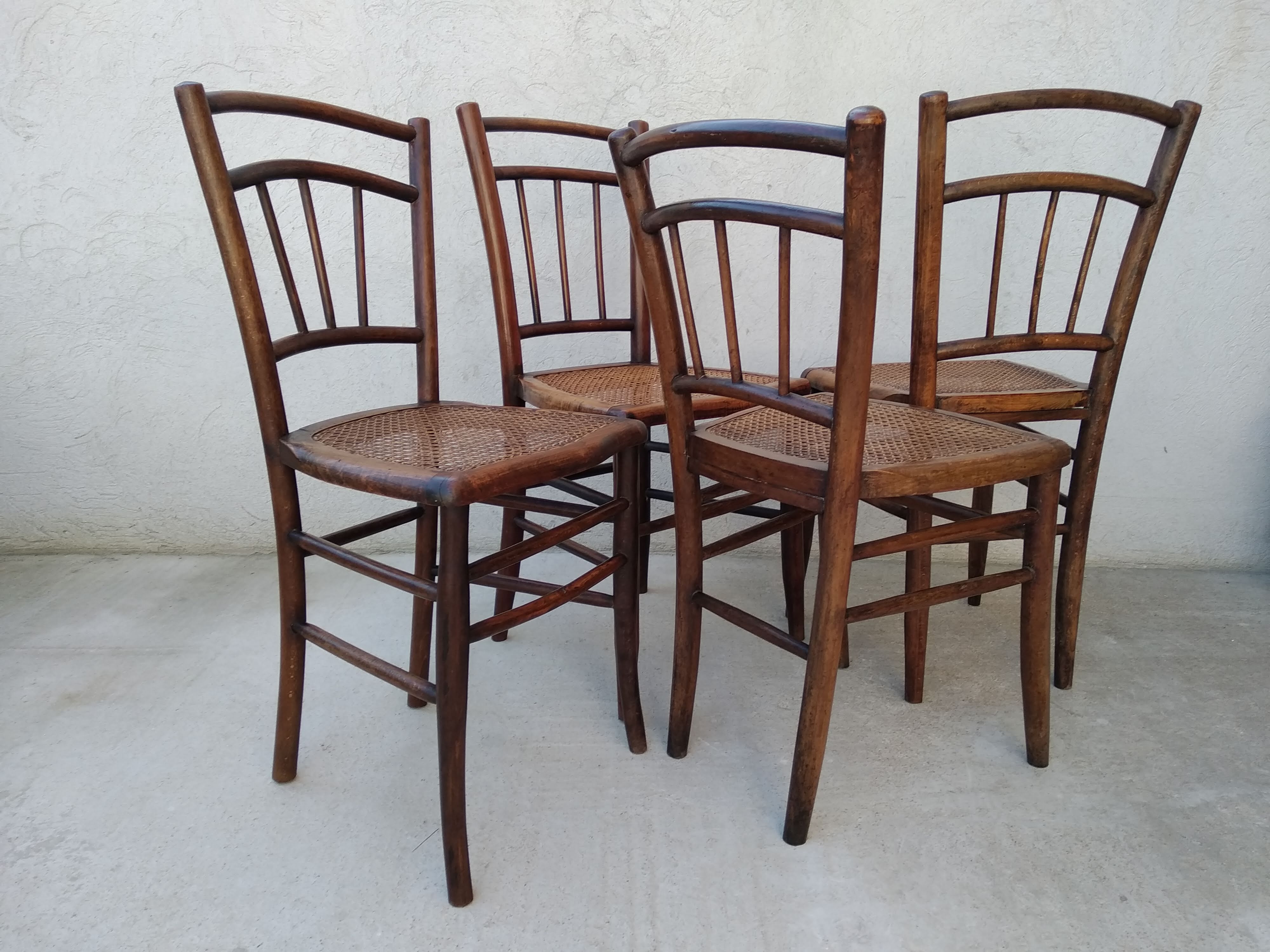 Set of 4 antique bistro chairs canned seats
