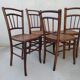 Set of 4 antique bistro chairs canned seats