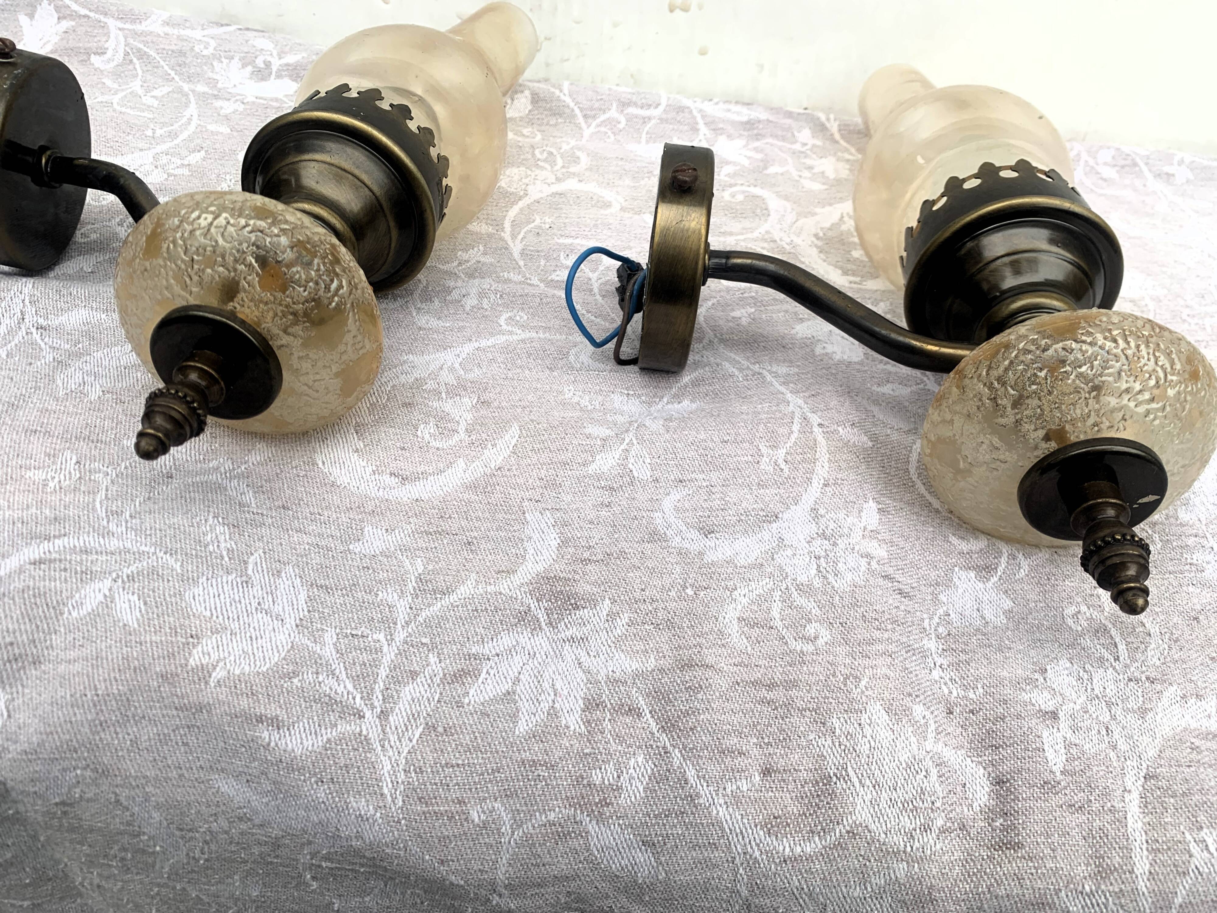 Matching pair of bronze wall sconces oil lamp style