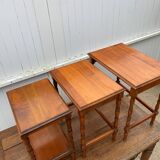 Set of 3 rustic cherry wood nesting coffee tables from the 1950s.