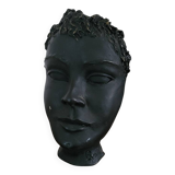 Black ceramic face sculpture