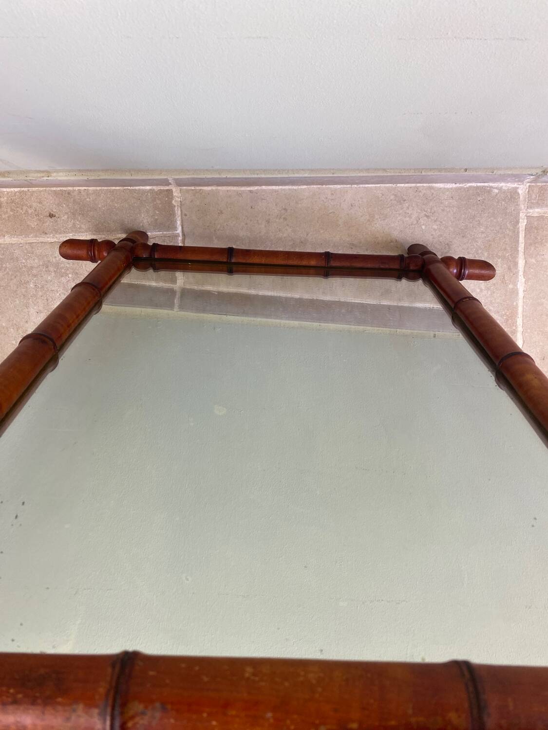 Antique turned wooden mirror