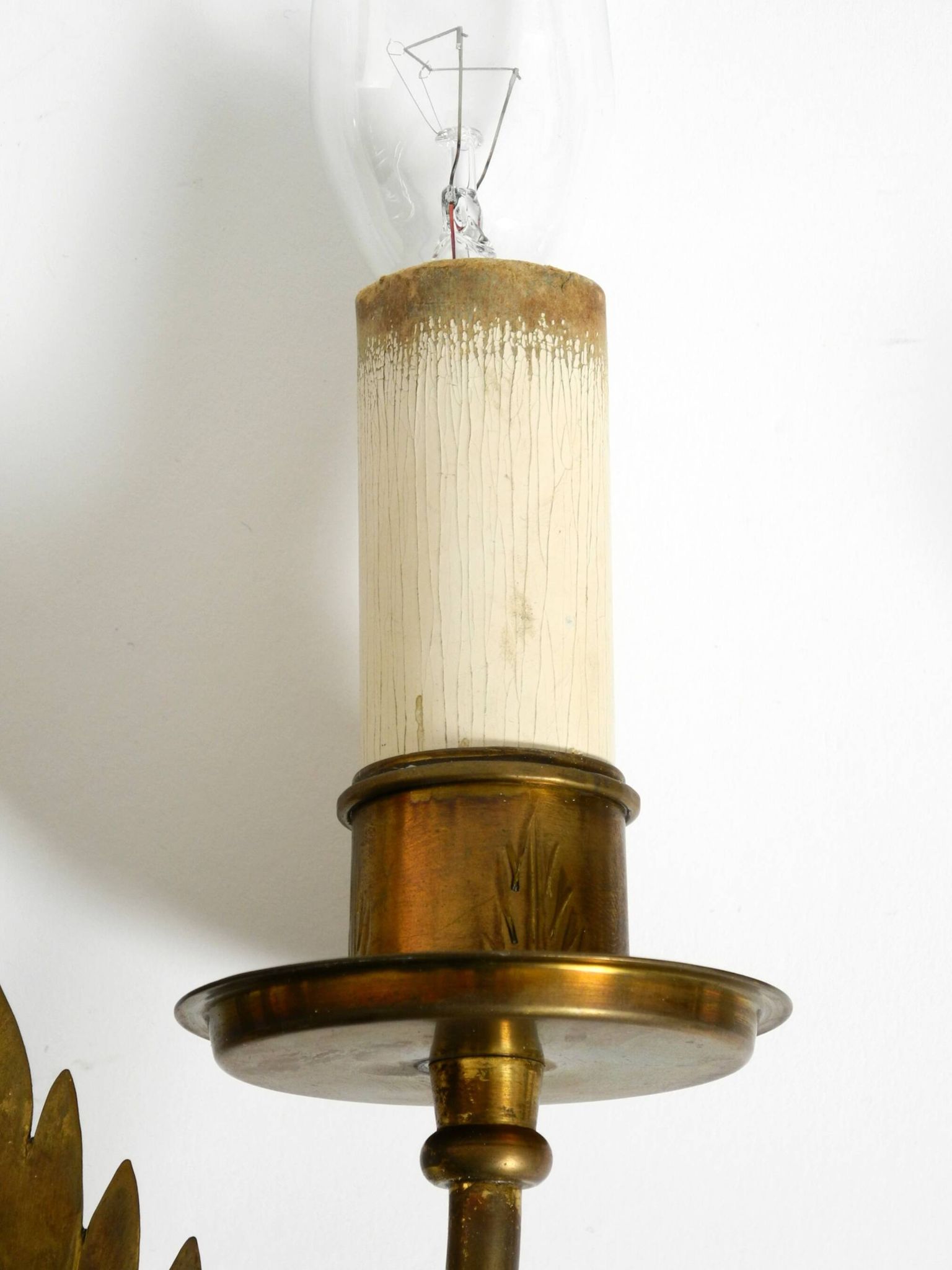 A pair of mid-century modern brass wall lamps by Vereinigte Werkstätten
