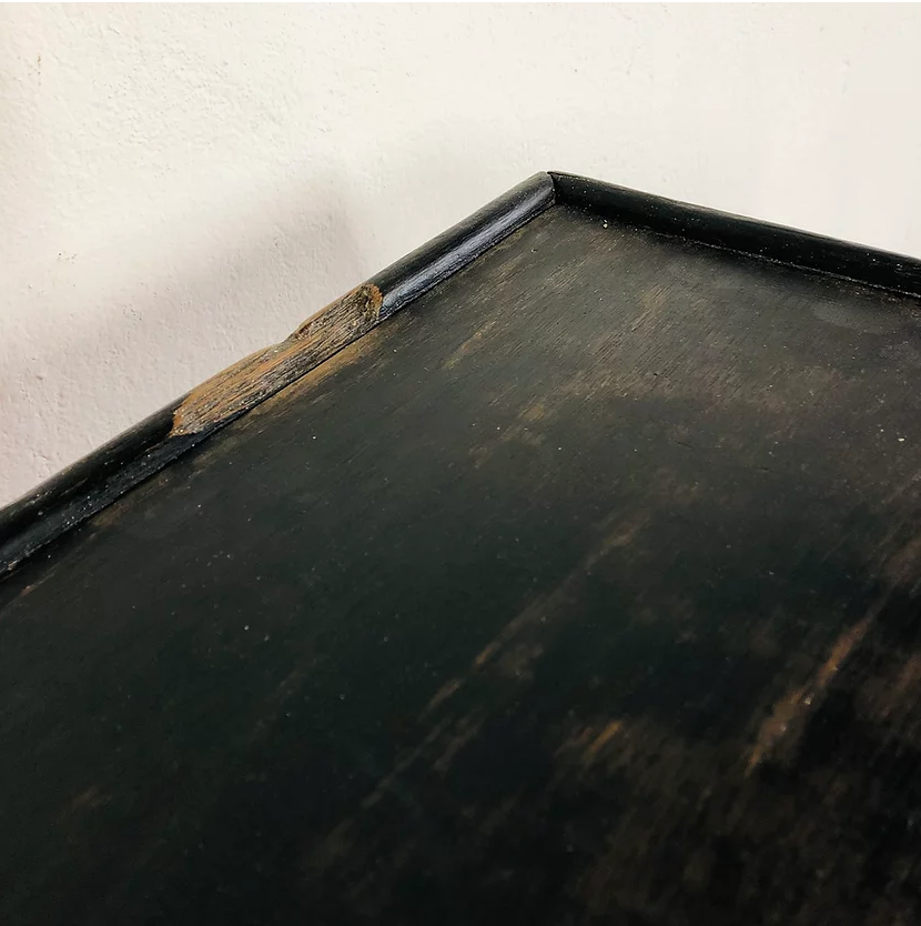 Antique black patinated bedside table