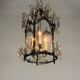 Louis XV style lantern in blackened brass adorned with cut crystal pendants, circa 1900.