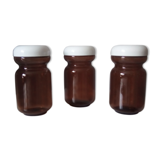 Batch of 70s amber glass jars
