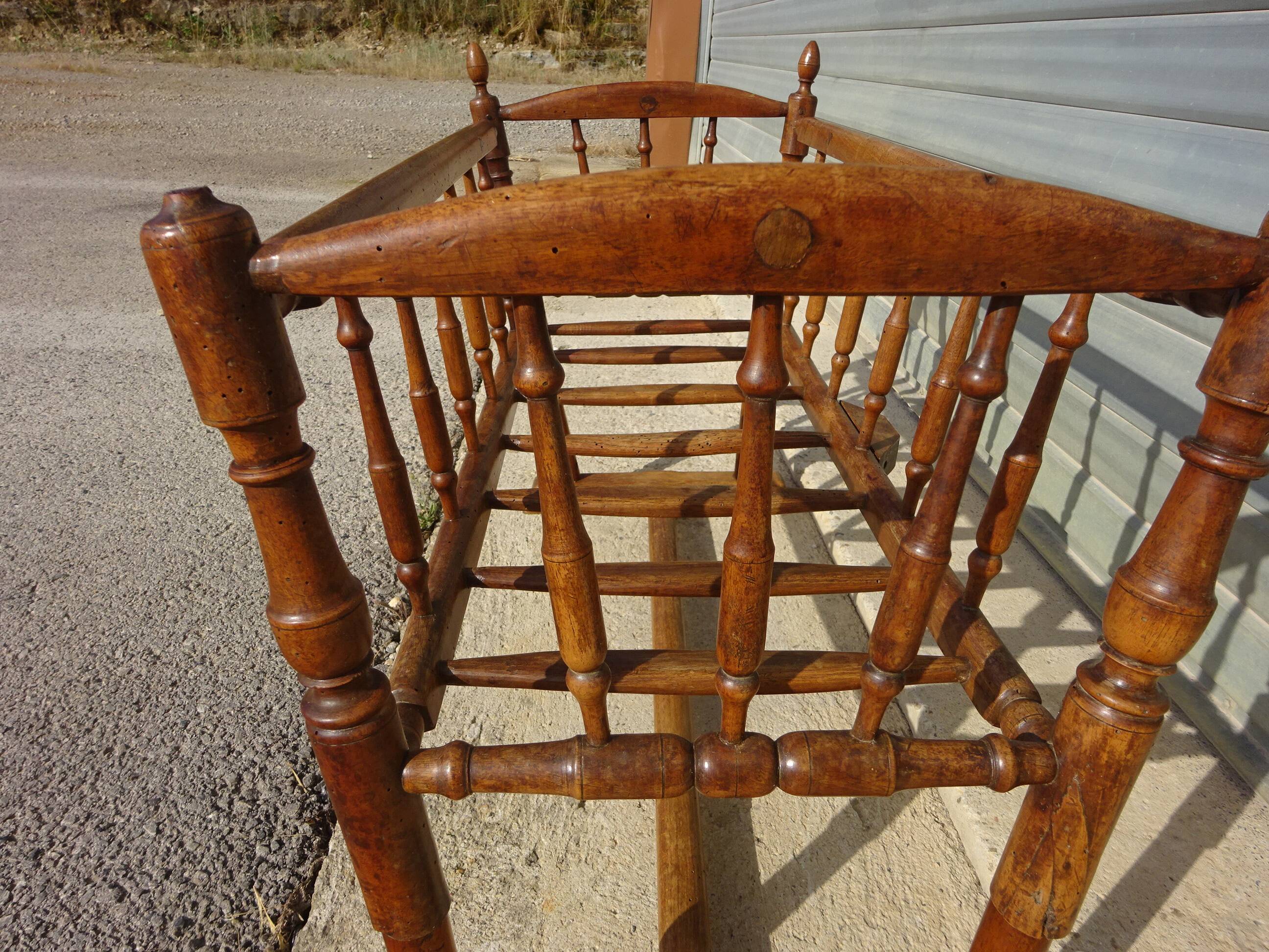 Old wooden cradle, all in walnut