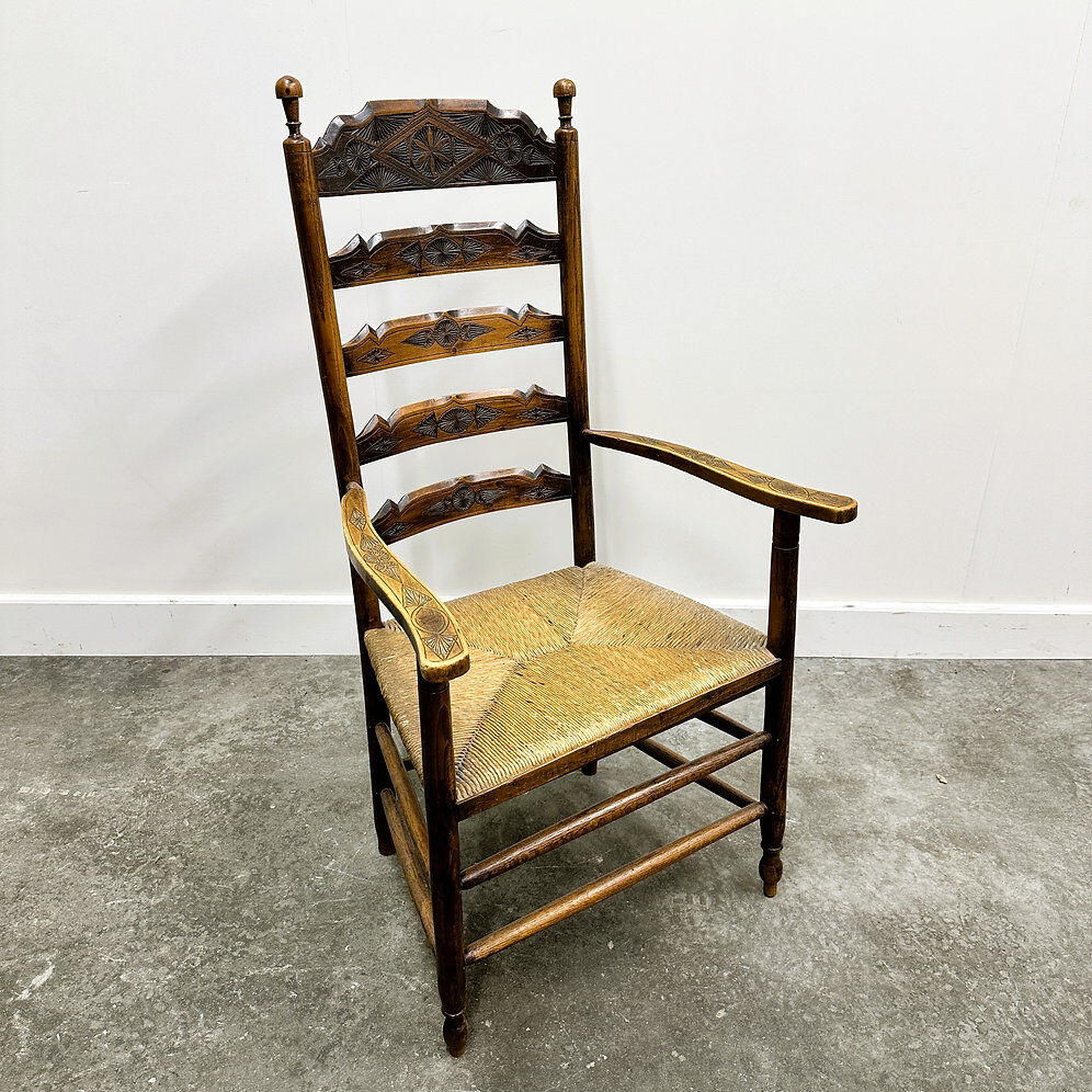 19th century handcrafted and carved ladder back chair, circa 1840s.