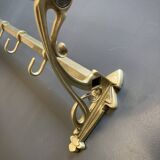 Art-deco wall-mounted coat rack in brass