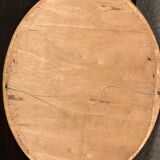 Large oval mirror in gilded wood