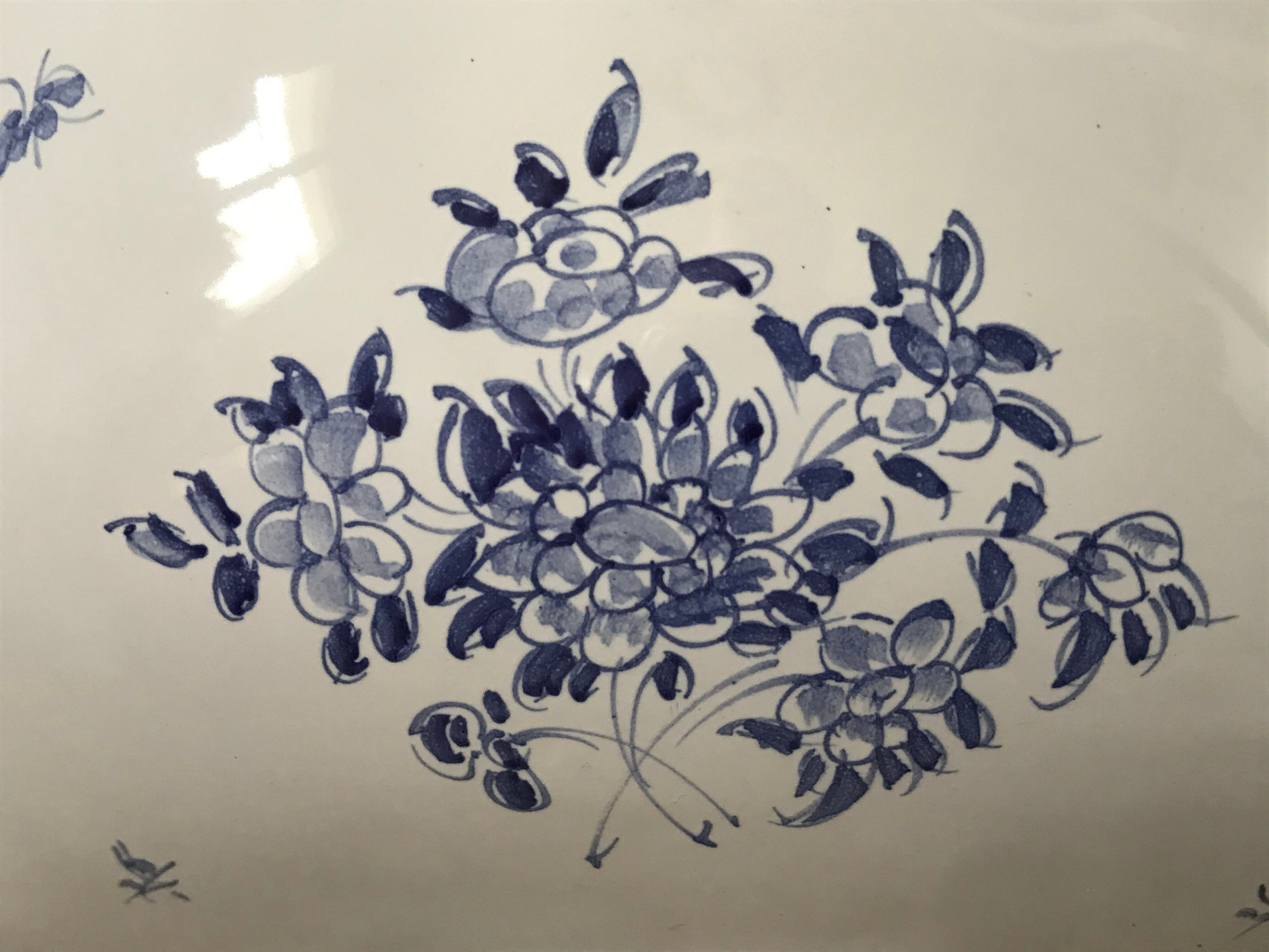 Pair of ceramic moustiers sconces