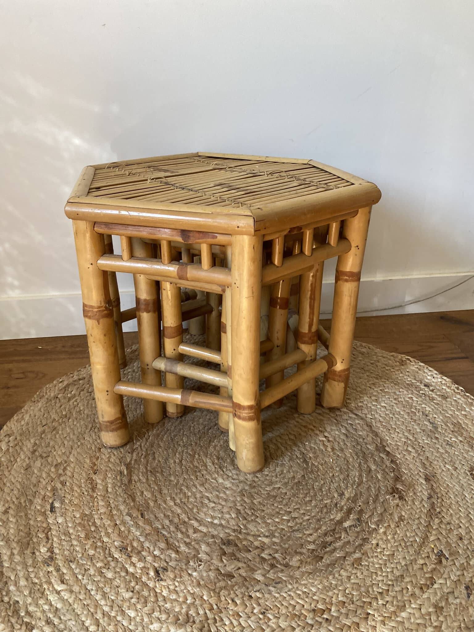 Set of three vintage rattan side tables.