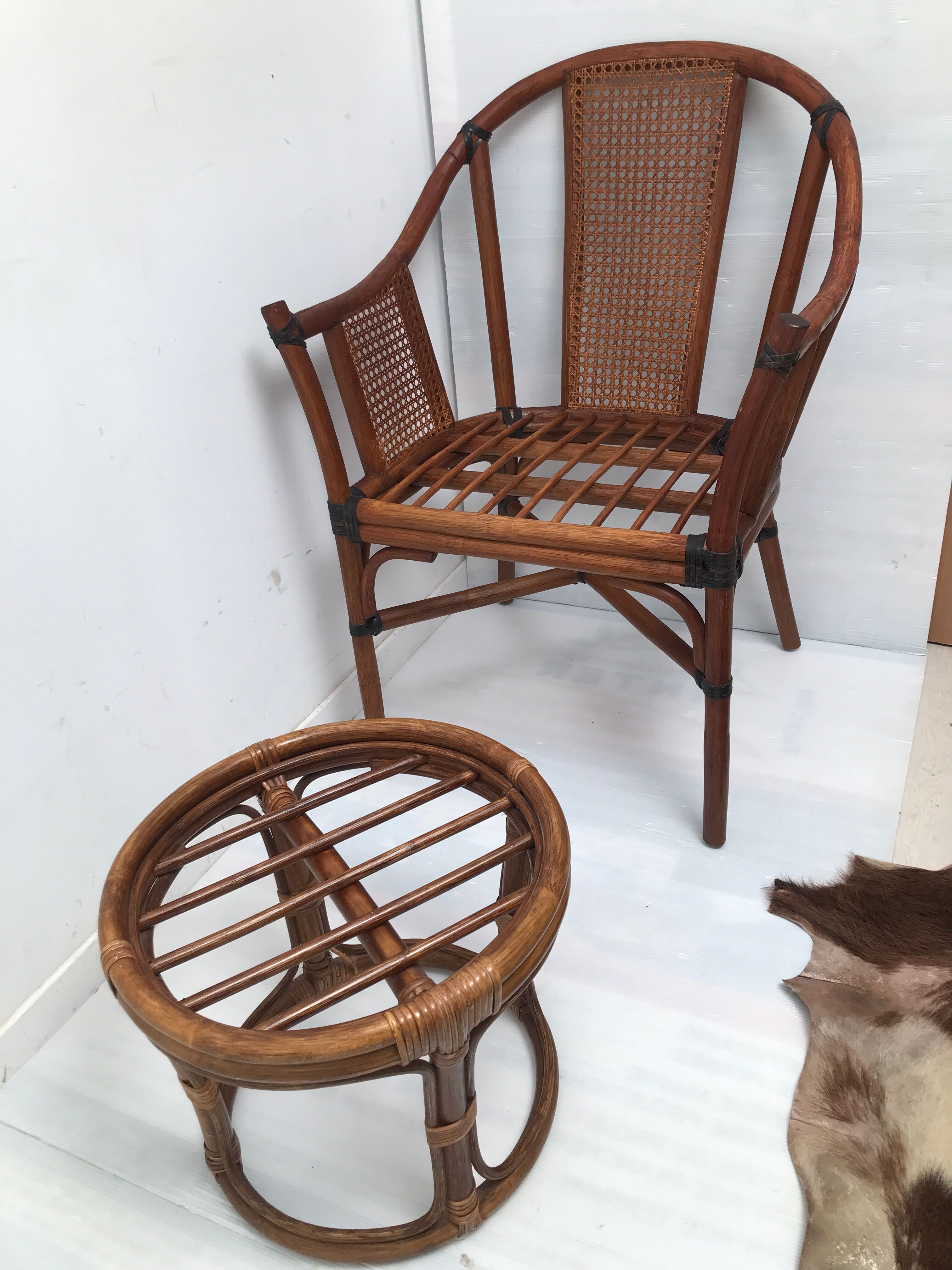 Rattan armchair with its footrest 70s