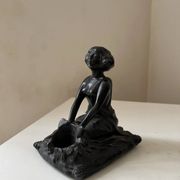 Art Nouveau spelter bookends, depicting an oriental woman, circa 1900