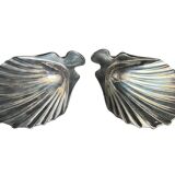 Set of two metal pocket emptiers, scallop shape