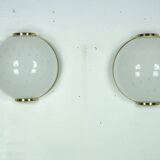 Pair of large round murano bullicante glass sconces with brass. Italy 1970s