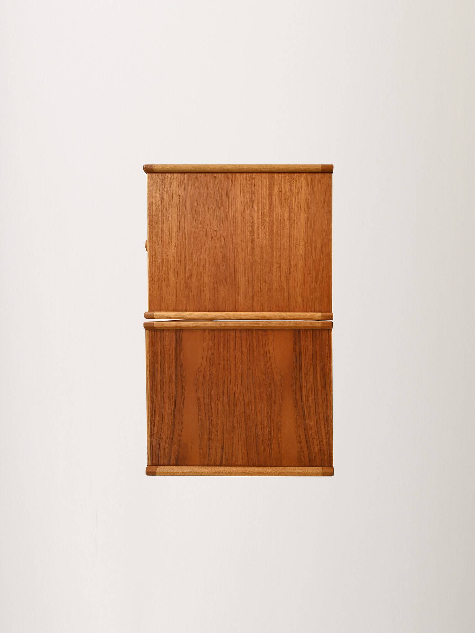 Pair of Scandinavian bedside tables from the 1950s–60s with carved handle