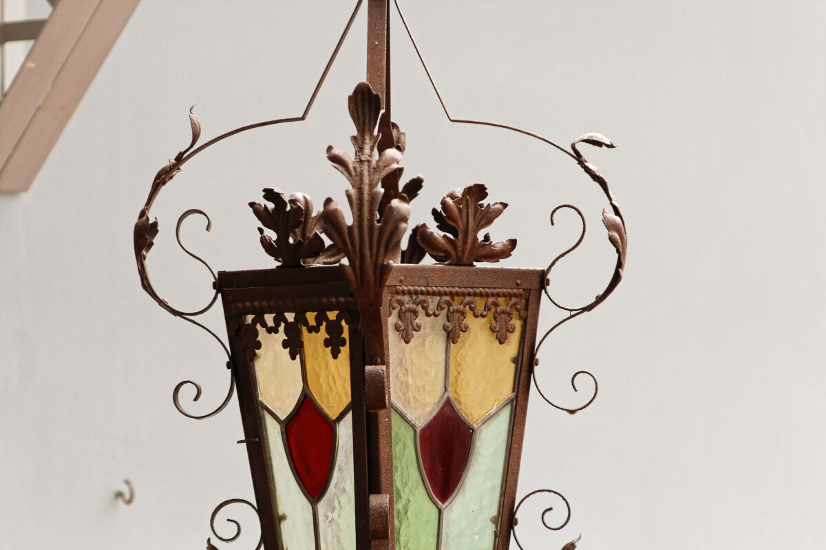 Wrought iron lantern and stained glass windows