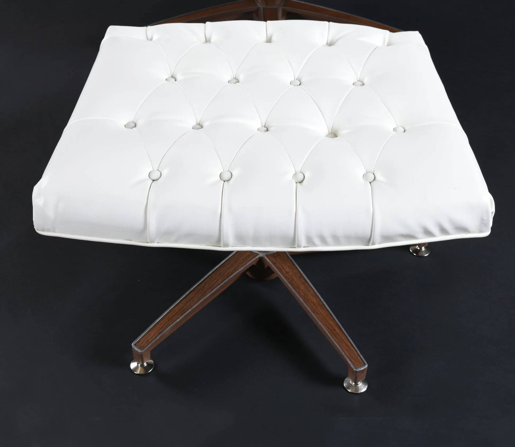 Restored George Mulhauser style white tufted tilt and swivel chair with ottoman