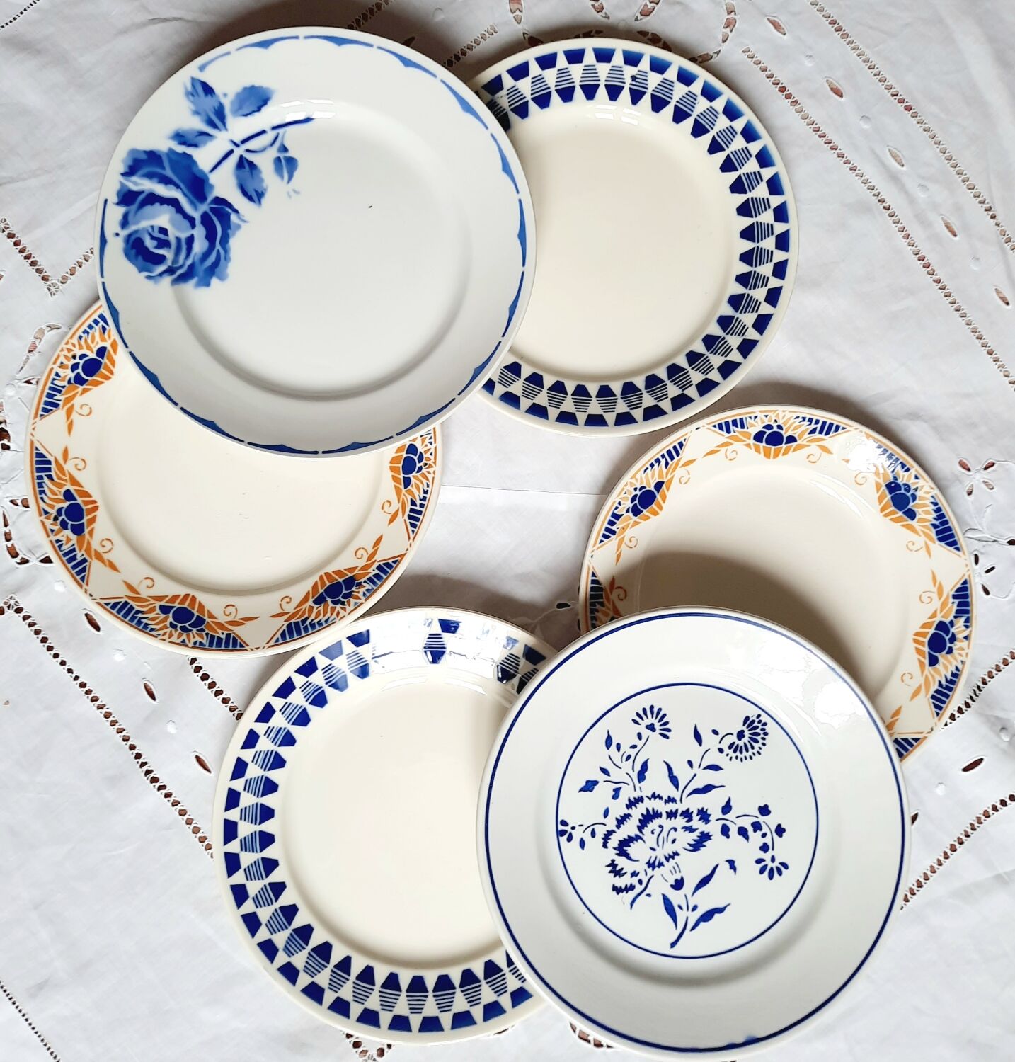 Old flat plates mismatched in earthenware