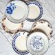 Old flat plates mismatched in earthenware
