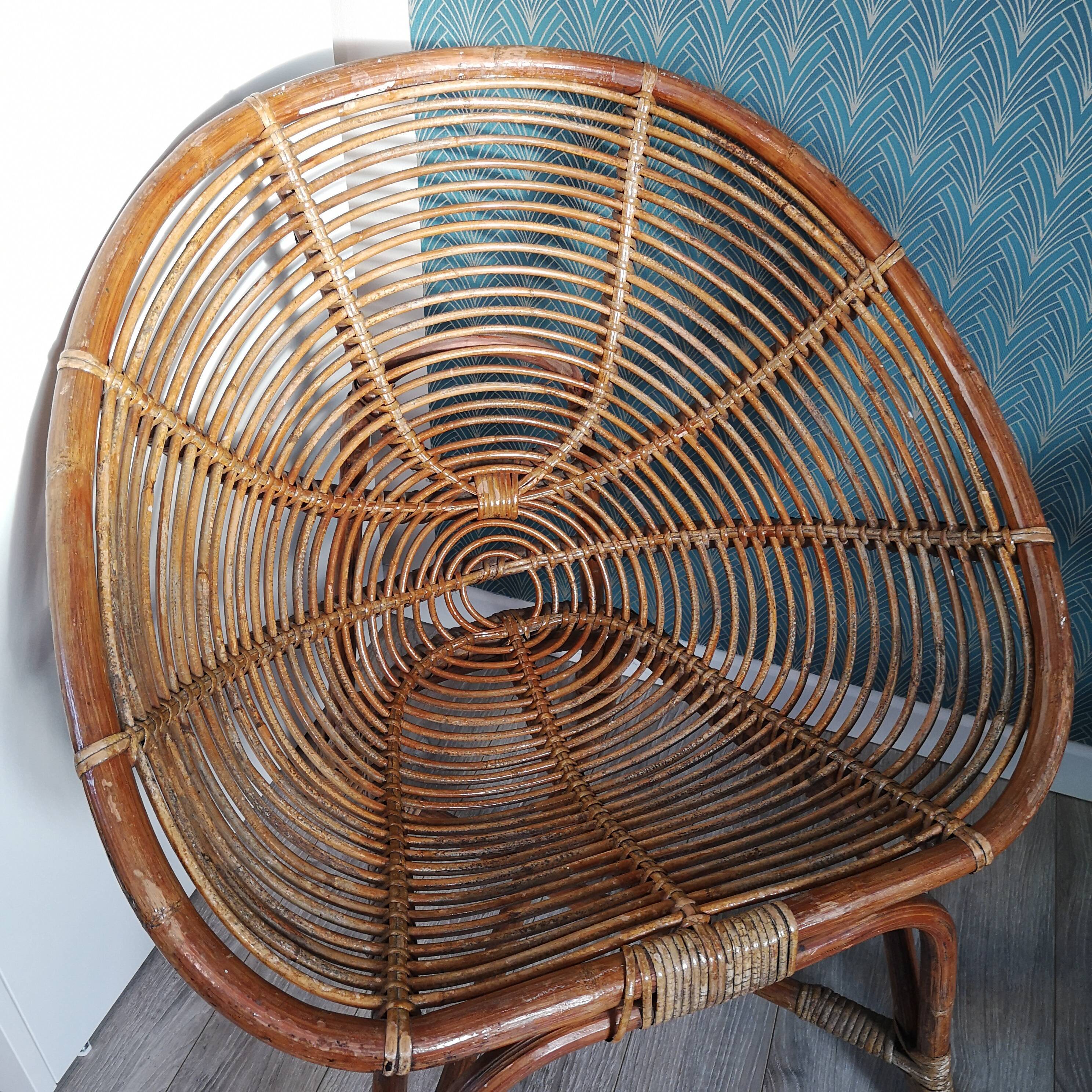 Paire de fauteuils coquille en osier