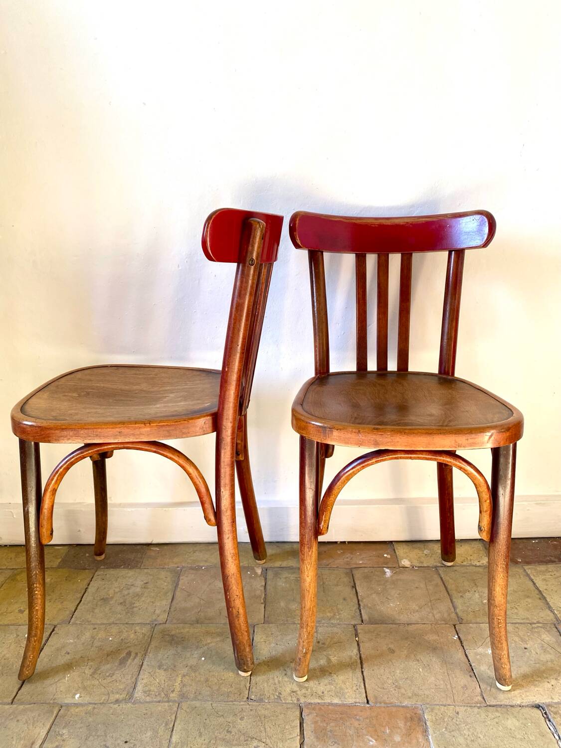 Pair of red Fischel chairs