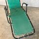 Green fabric and black metal tube long chair