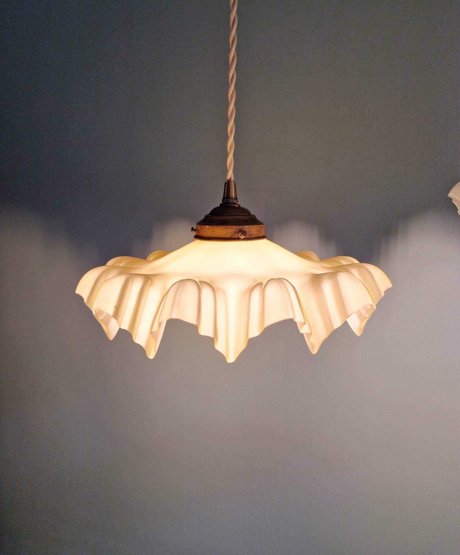 Art Deco trio of suspensions in coloured frilled opaline, 1920-30.
