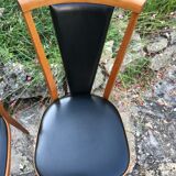 Four vintage beech and skai chairs