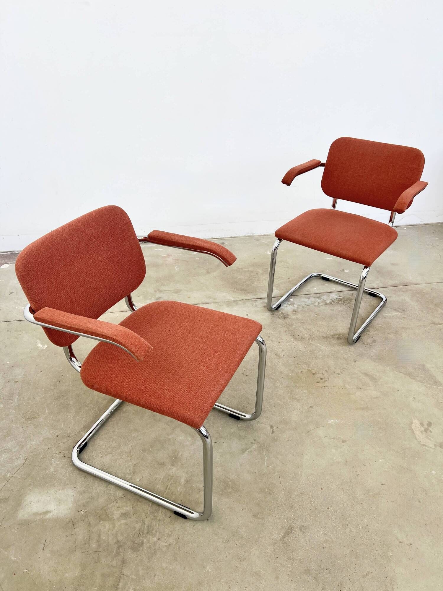 Pair of Marcel Breuer B64 Knoll armchairs in coral fabric