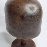 Old solid wood hat shape on foot, 1900