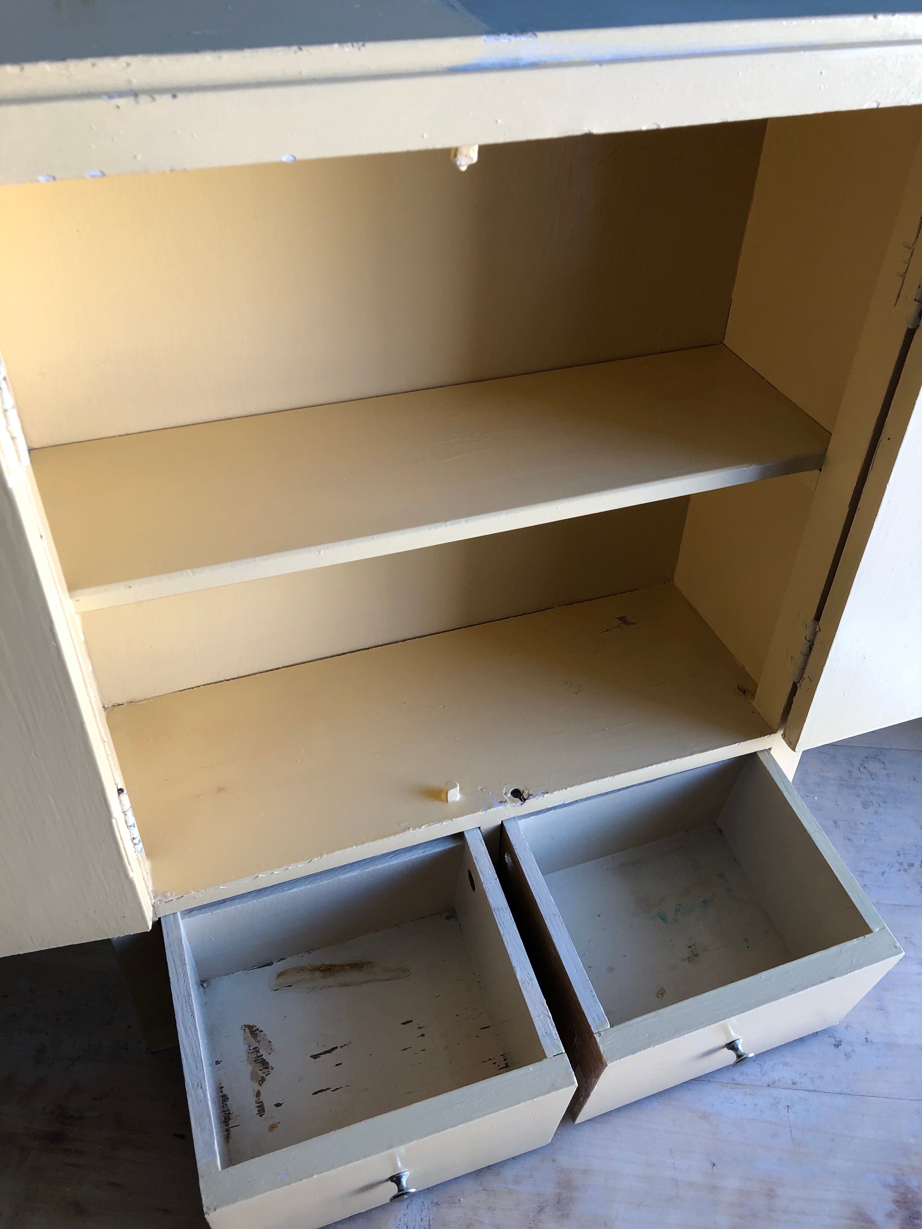 Weathered toilet cabinet