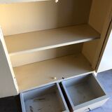 Weathered toilet cabinet