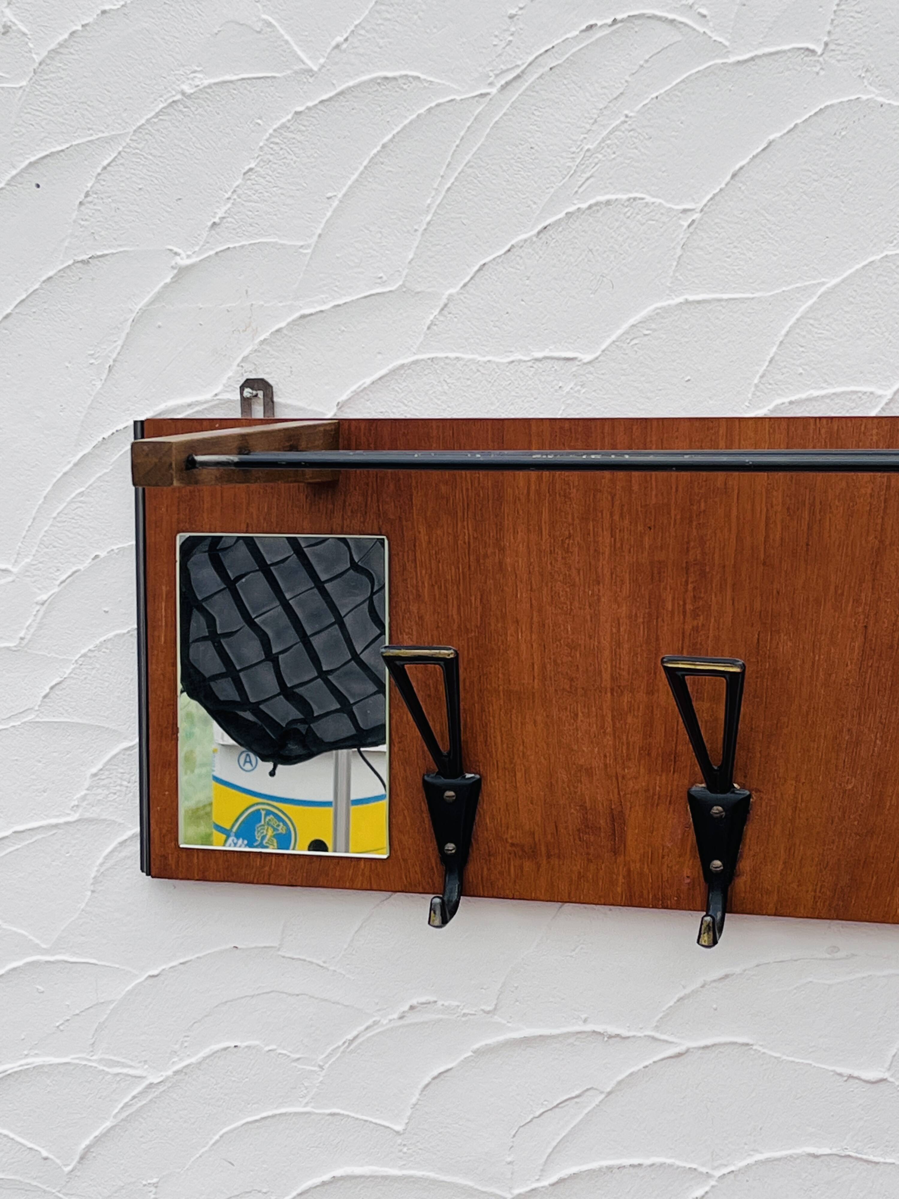 Vintage wooden wall coat rack mirror from the 1960s.